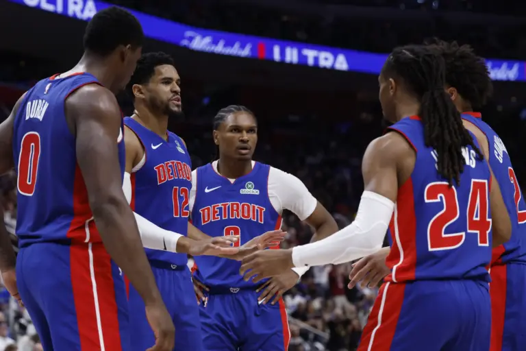 Detroit Pistons center Jalen Duren (0), forward Tobias Harris (12), guard Ausar Thompson (9), guard Cade Cunningham (2) and guard Daniss Jenkins (24) huddle up
