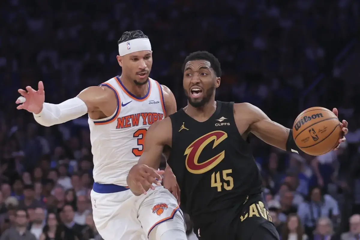 Cleveland Cavaliers guard Donovan Mitchell (45) dribbles against New York Knicks guard Josh Hart (3) during the second quarter of game one of the eastern conference finals during the 2026 NBA playoffs at Madison Square Garden. Cleveland looks to come back in this Cavaliers vs Knicks series by winning Game 2
