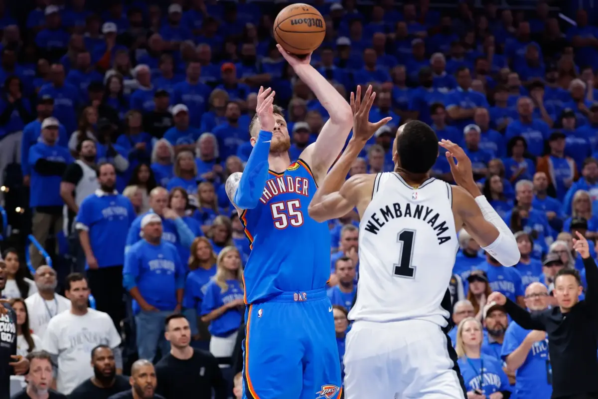 Oklahoma City Thunder center Isaiah Hartenstein (55) takes a shot as San Antonio Spurs forward Victor Wembanyama (1) defends during the fourth quarter during game two of the western conference finals for the 2026 NBA playoffs at Paycom Center. Thunder vs Spurs Game 3 looks to be another exciting chapter in this incredible series.