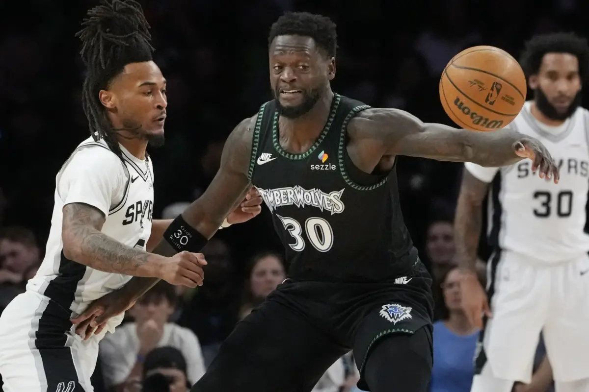The Minnesota Timberwolves traded Julius Randle and the No. 28 pick to the Brooklyn Nets to shed massive salary and clear a path to keep Ayo Dosunmu.