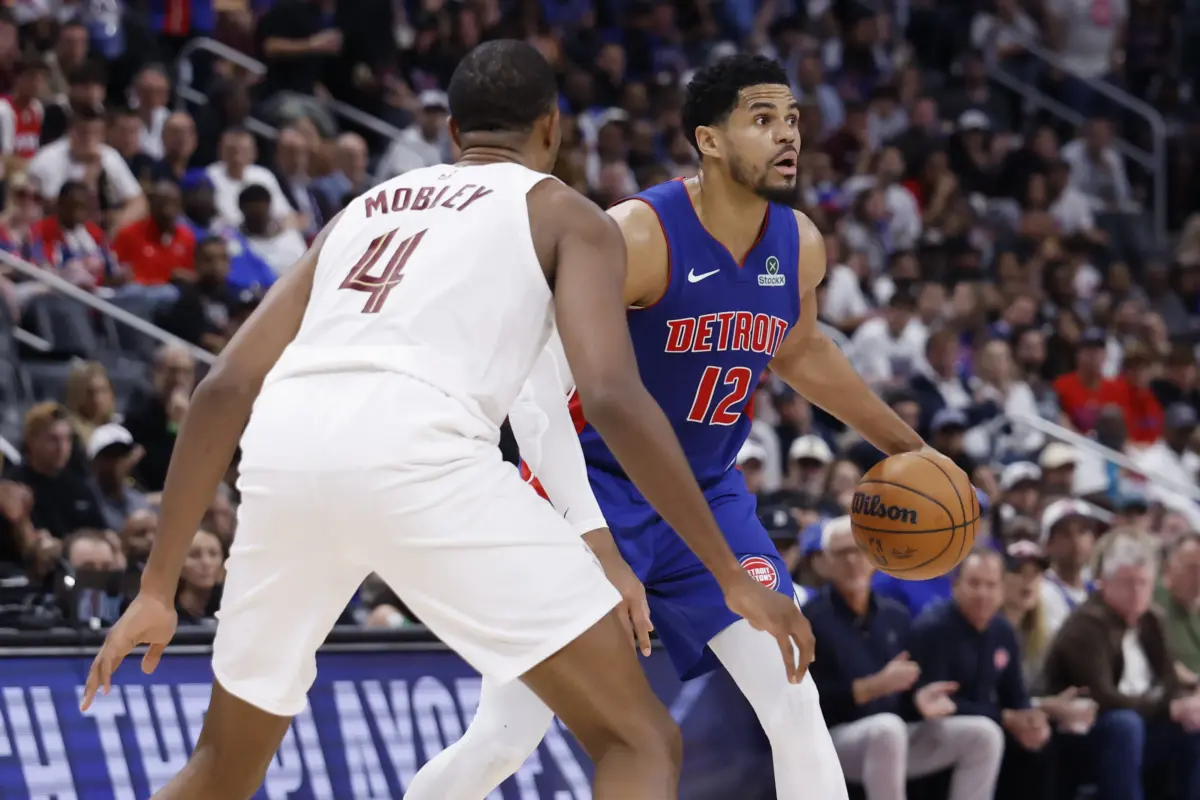 May 17, 2026; Detroit, Michigan, USA; Detroit Pistons forward Tobias Harris (12) is defended by Cleveland Cavaliers center Evan Mobley (4) in the second half during game seven of the second round of the 2026 NBA Playoffs at Little Caesars Arena. Mandatory Credit: Rick Osentoski-Imagn Images. Tobias Harris gets a solid grade for the Detroit Pistons Power Forwards