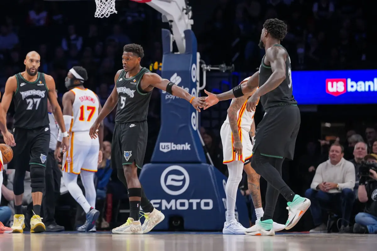 Feb 9, 2026; Minneapolis, Minnesota, USA; Minnesota Timberwolves guard Anthony Edwards (5) celebrates with forward Julius Randle (30) against the Atlanta Hawks in the first quarter at Target Center. Mandatory Credit: Brad Rempel-Imagn Images