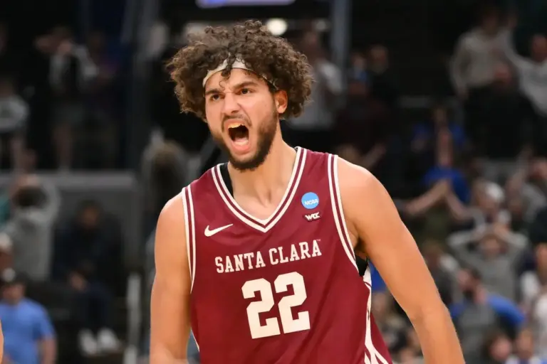 Mar 20, 2026; St. Louis, MO, USA; Santa Clara Broncos forward Allen Graves (22) reacts after making a basket against the Kentucky Wildcats during the second half of a first round game of the men's 2026 NCAA Tournament at Enterprise Center. Mandatory Credit: Jeff Curry-Imagn Images