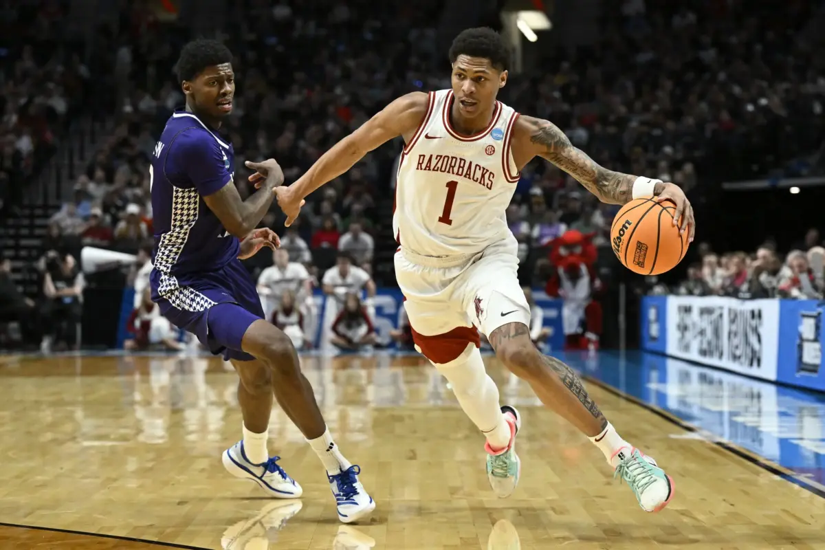 Mar 21, 2026; Portland, OR, USA; Arkansas Razorbacks guard Meleek Thomas (1) drives against High Point Panthers guard Scotty Washington (12) in the first half during a second round game of the men's 2026 NCAA Tournament at Moda Center. Mandatory Credit: Craig Strobeck-Imagn Images. He would be a good fit next to Jalen Brunson and the Knicks.