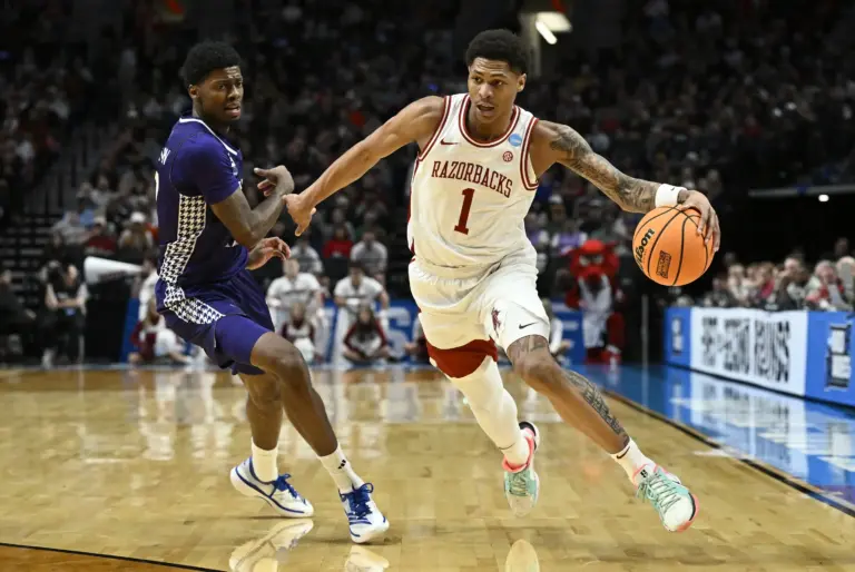 Mar 21, 2026; Portland, OR, USA; Arkansas Razorbacks guard Meleek Thomas (1) drives against High Point Panthers guard Scotty Washington (12) in the first half during a second round game of the men's 2026 NCAA Tournament at Moda Center. Mandatory Credit: Craig Strobeck-Imagn Images. He would be a good fit next to Jalen Brunson and the Knicks.