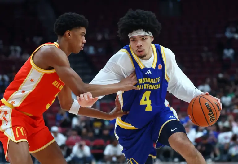 Mar 31, 2026; Glendale, AZ, USA; Tyran Stokes (4) moves the ball against Bruce Branch III (3) during the McDonalds All American Boys Game at Desert Diamond Arena. Mandatory Credit: Mark J. Rebilas-Imagn Images. Stokes has the potential to be the first overall pick in the 2027 NBA Draft.