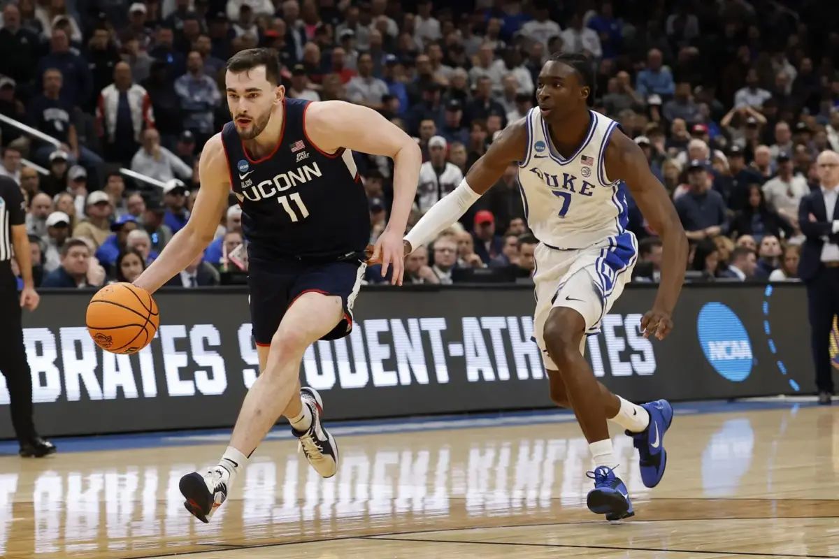 Alex Karaban gives the Timberwolves a safe draft fit at 28 with size, shooting and age, while Minnesota keeps the 59th pick for a bigger swing this summer.