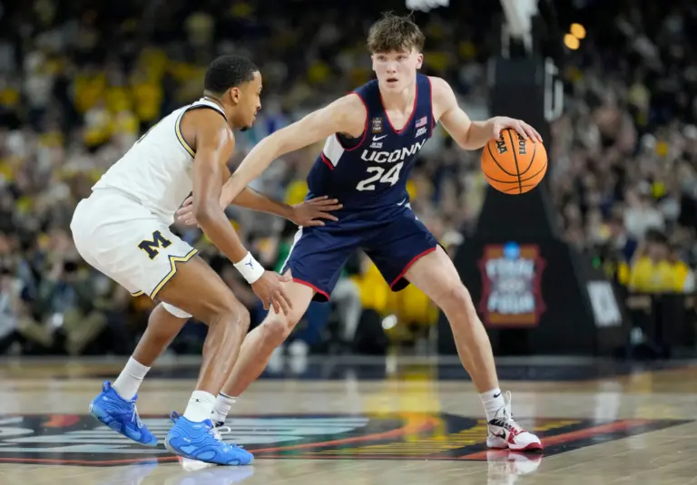 UConn Huskies guard Braylon Mullins (24) looks for space Monday, April 6, 2026, against the Michigan Wolverines during the NCAA men's basketball tournament national championship game at Lucas Oil Stadium in Indianapolis. Mullins is one of the best returning prospects in the 2027 NBA Draft.