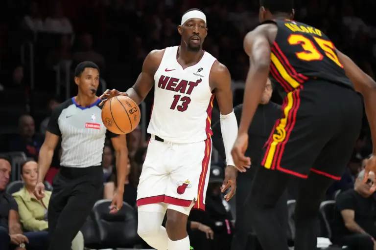 Miami heat forward Bam Adebayo (13) dribbles against Atlanta Hawks center Christian Koloko (35) during the second half at Kaseya Center.
