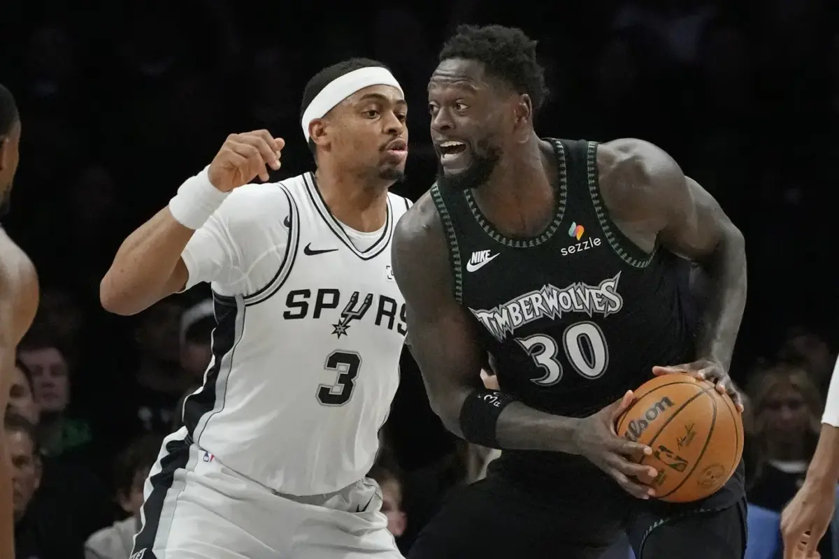 May 10, 2026; Minneapolis, Minnesota, USA; Minnesota Timberwolves forward Julius Randle (30) works around San Antonio Spurs forward Keldon Johnson (3) in the first quarter of game four of the second round of the 2026 NBA Playoffs at Target Center. Mandatory Credit: Bruce Kluckhohn-Imagn Images