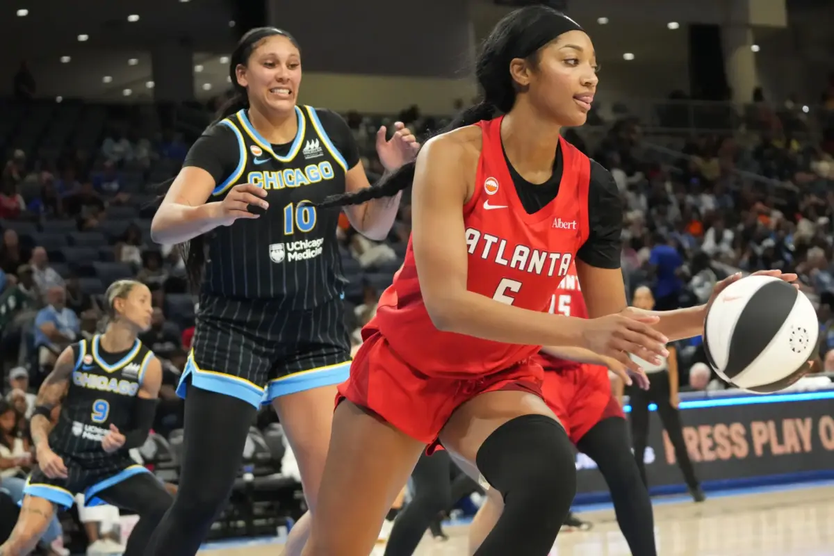 Jun 9, 2026; Chicago, Illinois, USA; Atlanta Dream forward Angel Reese (5) grabs a rebound in front of Chicago Sky center Kamilla Cardoso (10) during the second half at Wintrust Arena. Mandatory Credit: David Banks-Imagn Images. The Liberty vs Dream game will be an intriguing matchup between two strong teams.
