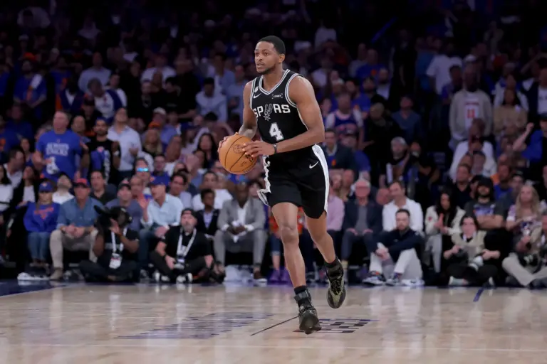 Jun 10, 2026; New York, New York, USA; San Antonio Spurs guard De'aaron Fox (4) brings the ball up court against the New York Knicks during the fourth quarter of game four of the 2026 NBA Finals at Madison Square Garden. Mandatory Credit: Brad Penner-Imagn Images