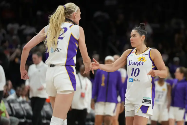 Jun 13, 2026; Phoenix, Arizona, USA; Los Angeles Sparks forward Cameron Brink (22) and guard Kelsey Plum (10) celebrate after defeating the Phoenix Mercury in overtime at Mortgage Matchup Center. Mandatory Credit: Rick Scuteri-Imagn Images. The Sparks vs Valkyries game looks to be an exciting match between two California teams.