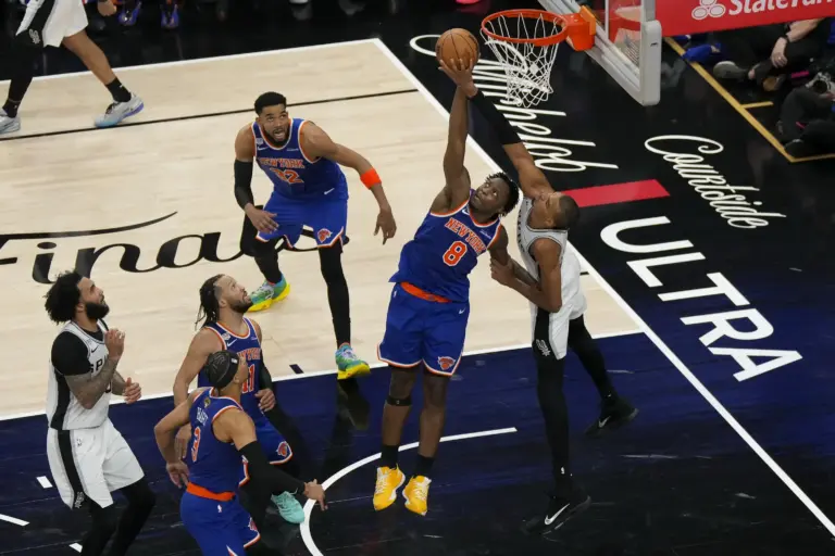 Jun 13, 2026; San Antonio, Texas, USA; New York Knicks forward Og Anunoby (8) and San Antonio Spurs forward Victor Wembanyama (1) leap for the ball during the fourth quarter during game five of the 2026 NBA Finals at Frost Bank Center. Mandatory Credit: Scott Wachter-Imagn Images