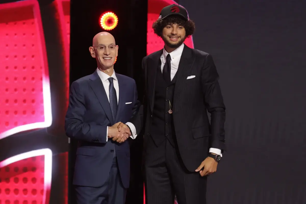 Jun 23, 2026; New York, NY, USA; NBA commissioner Adam Silver greets the nineteenth pick in the 2026 NBA draft, Santa Clara forward Allen Graves after he was selected by the Toronto Raptors at Barclays Center. Mandatory Credit: Brad Penner-Imagn Images