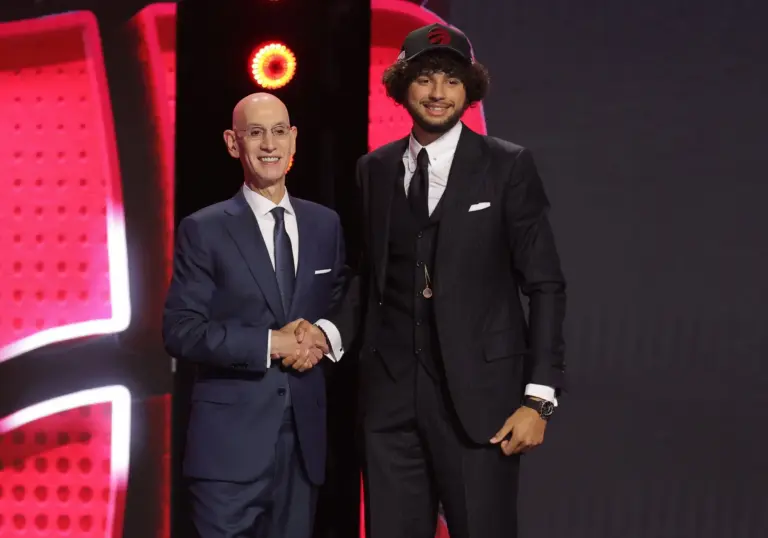 Jun 23, 2026; New York, NY, USA; NBA commissioner Adam Silver greets the nineteenth pick in the 2026 NBA draft, Santa Clara forward Allen Graves after he was selected by the Toronto Raptors at Barclays Center. Mandatory Credit: Brad Penner-Imagn Images