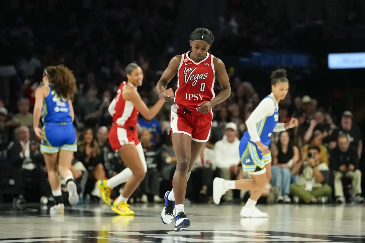 Jun 25, 2026; Las Vegas, Nevada, USA; Las Vegas Aces guard Jackie Young (0) reacts after scoring against the Dallas Wings during the fourth quarter of a WNBA basketball game at Michelob Ultra Arena. Mandatory Credit: Lucas Peltier-Imagn Images. The Aces vs Sky game looks to be another opportunity to score another win for the Aces.
