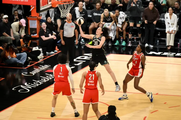 Jun 30, 2026; Brooklyn, New York, USA; New York Liberty forward Breanna Stewart (30) drives past Las Vegas Aces guard Jackie Young (0) during the second half at Barclays Center. Mandatory Credit: John Jones-Imagn Images. The Liberty ultimately got their Commissioner's Cup Final Win over the Aces.