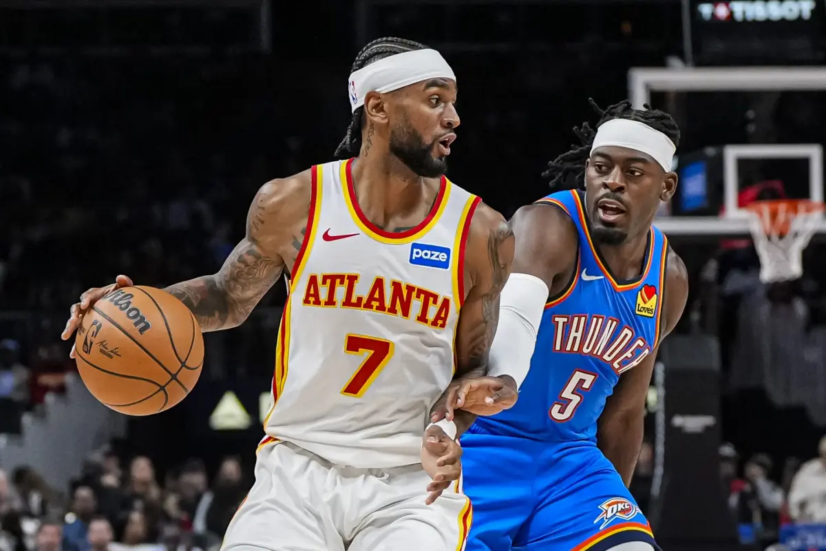 Hawks guard Nickeil Alexander-Walker vs. Lu Dort.