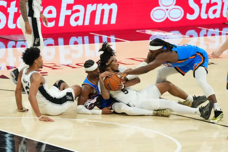 Lu Dort gives Atlanta another elite perimeter defender after a blockbuster three-team trade.