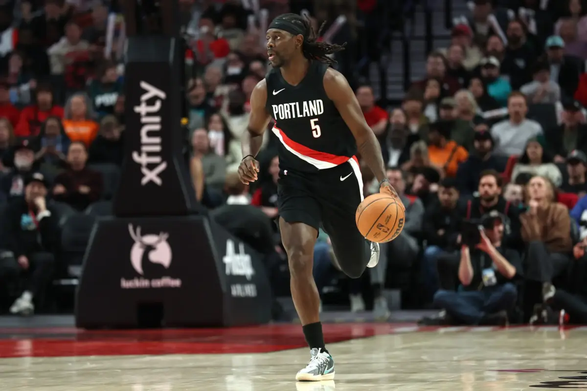 Mar 23, 2026; Portland, Oregon, USA; Portland Trail Blazers guard Jrue Holiday (5) brings the ball up the court against the Brooklyn Nets during the first half at Moda Center. Mandatory Credit: Jaime Valdez-Imagn Images. Jrue Holiday-Hornets fit conversation is a discussion worth having.