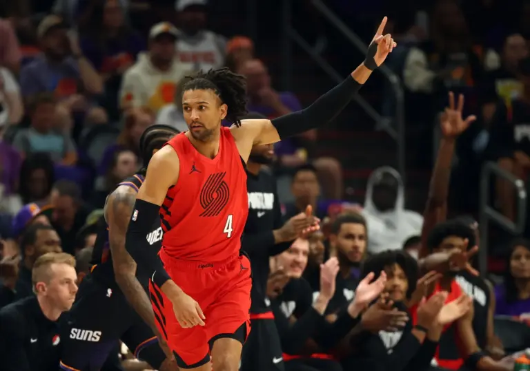 Apr 14, 2026; Phoenix, Arizona, USA; Portland Trail Blazers guard Matisse Thybulle (4) celebrates a three point shot against the Phoenix Suns in the first half during the play-in rounds of the 2026 NBA Playoffs at Mortgage Matchup Center. Mandatory Credit: Mark J. Rebilas-Imagn Images. Thybulle is one of the most underrated free agents left in the market.