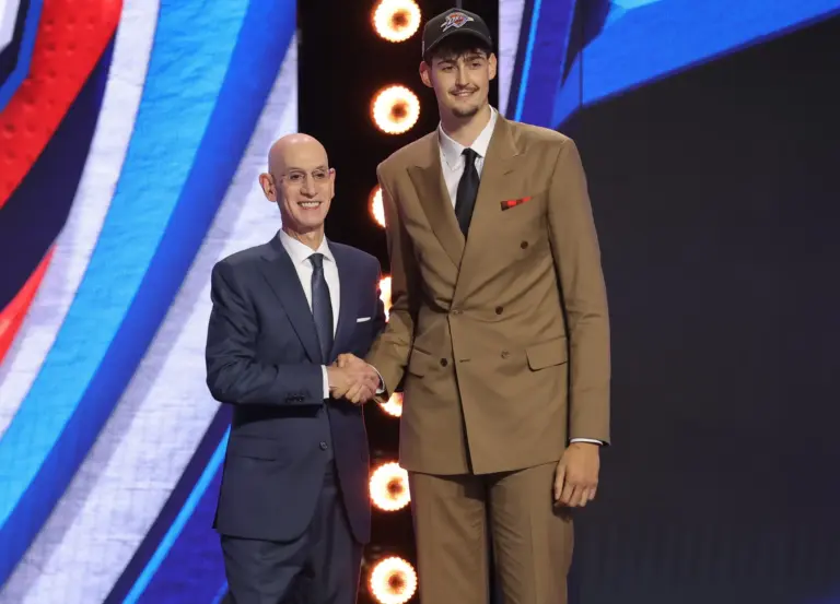 Jun 23, 2026; New York, NY, USA; NBA commissioner Adam Silver greets the twelfth pick in the 2026 NBA draft, Michigan center Aday Mara after he was selected by the Oklahoma City Thunder at Barclays Center. Mandatory Credit: Brad Penner-Imagn Images. Mara joins Bennett Stirtz and Otega Oweh on the Thunder's Summer League team.