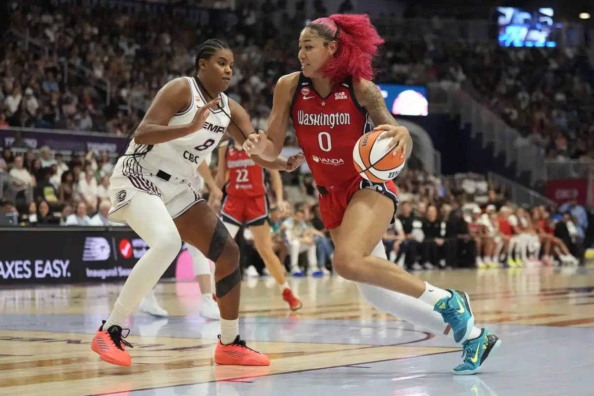 Jul 14, 2026; Toronto, Ontario, CAN; Washington Mystics forward Shakira Austin (0) drives to the basket against Toronto Tempo center Nyara Sabally (8) during the first half at Coca-Cola Coliseum. Mandatory Credit: John E. Sokolowski-Imagn Images. Austin and her team will look to win their upcoming Mystics vs Valkyries match.