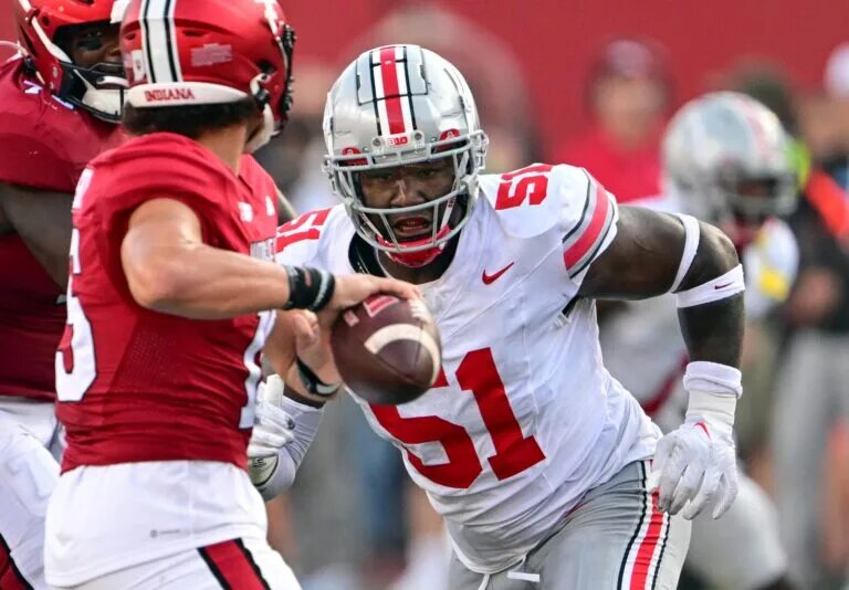 Strengths Very athletic; 9.56 RAS 99th percentile speed for defensive tackles Had great Senior Bowl workouts Very quick off the snap from the interior Has utilized both finesse and power techniques well Has explosive power and speed to disrupt the quarterback Weaknesses A bit undersized, could get worn down against NFL-sized linemen Conditioning has been an issue Needs to develop blocking scheme recognition Needs work in hand-fighting While he shows flashes, he disappears for stretches of games NFL Comparison: Geno Atkins Projected Round: Second/Third Round Best Fits: Cincinnati Bengals, Jacksonville Jaguars, Baltimore Ravens, Kansas City Chiefs Bottom Line on Michael Hall Hall was a very solid defensive tackle for the Buckeyes over the last two years but he was plagued by inconsistency. On one hand, he was able to take over games, as he did in his first start against Notre Dame in 2022. On the other, there was a feeling that he was sitting out injured because he was a non-factor. Hall’s ceiling is very, very high. He has shown flashes of brilliance that could develop into a Pro Bowl-level player. He’s incredibly quick off the snap and is able to disrupt the quarterback right off the bat. Against teams like Wisconsin who are known for their offensive line and rushing attack, Hall was able to blow through the line and hold their star running back to having a pedestrian day. The question with Hall will be development. If he goes to the wrong system or his effort falls off, he could be a candidate to be let go before his rookie contract is up. If he’s developed, Hall could have a Cameron Heyward-like career in terms of longevity. His athleticism alone will be enough for NFL teams to be willing to take a chance on him. Main Image: Marc Lebryk-USA TODAY Sports