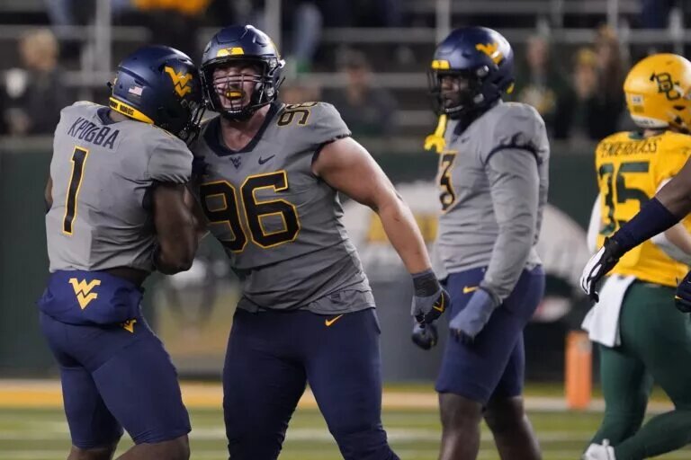 wvu reshuffling its defensive line