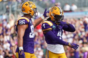 We discuss John Emery's decision to withdraw his name from the Transfer Portal and what it means to the LSU running back room.
