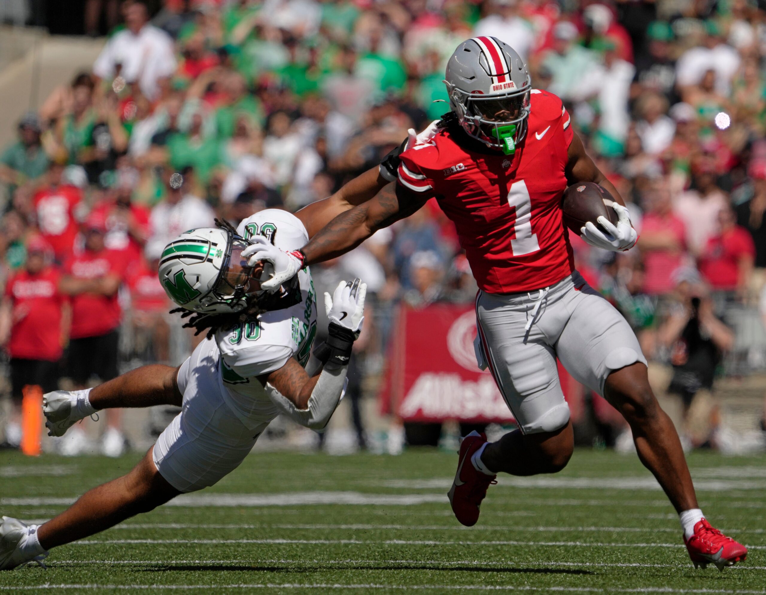 Buckeyes Thunder Past The Herd, 49-14