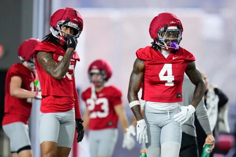 Chris Henry Jr. and Jeremiah Smith at practice