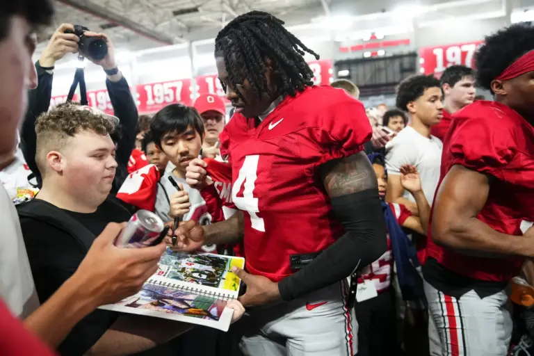 Jeremiah Smith signing autographs