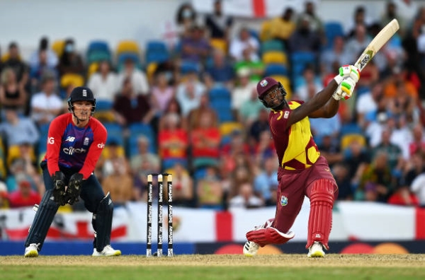 Rovman Powell in action for the West Indies vs England.