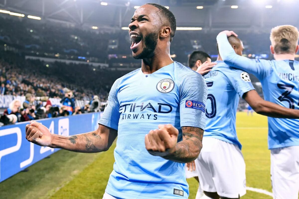Photograph of Raheem Sterling celebrating a goal