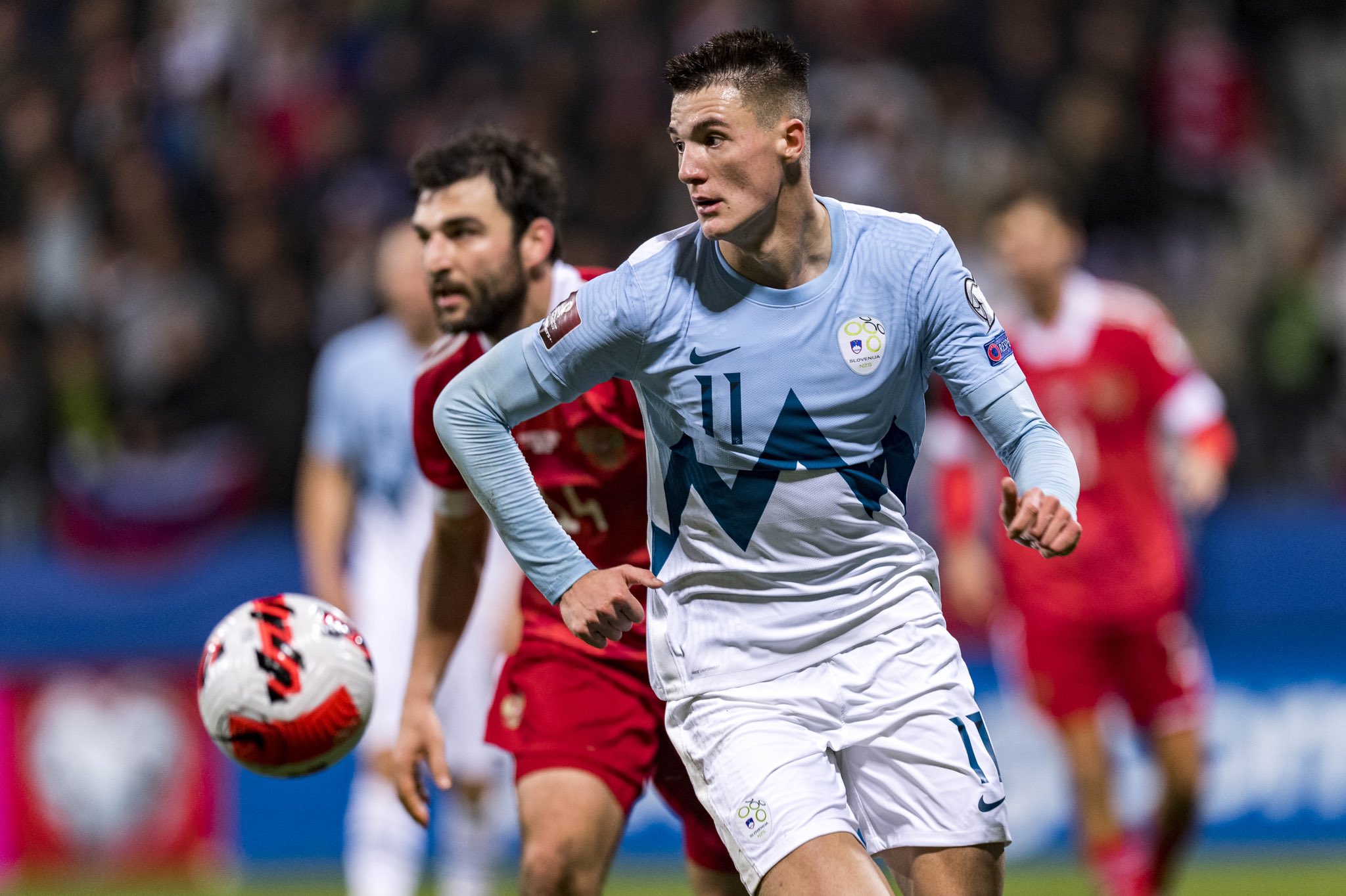 Leipzig's Benjamin Sesko, top, heads the ball during the German