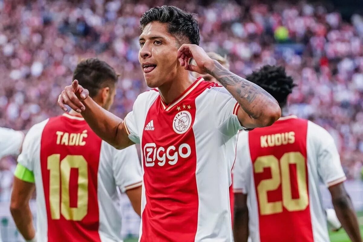 Edson Alvarez of Ajax points to his ear