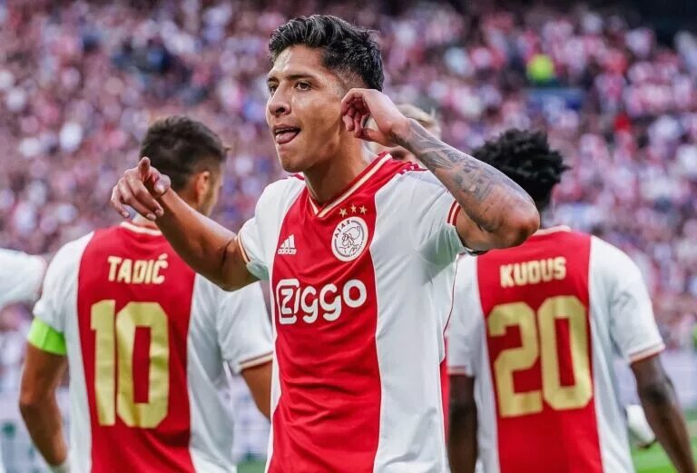 Edson Alvarez of Ajax points to his ear