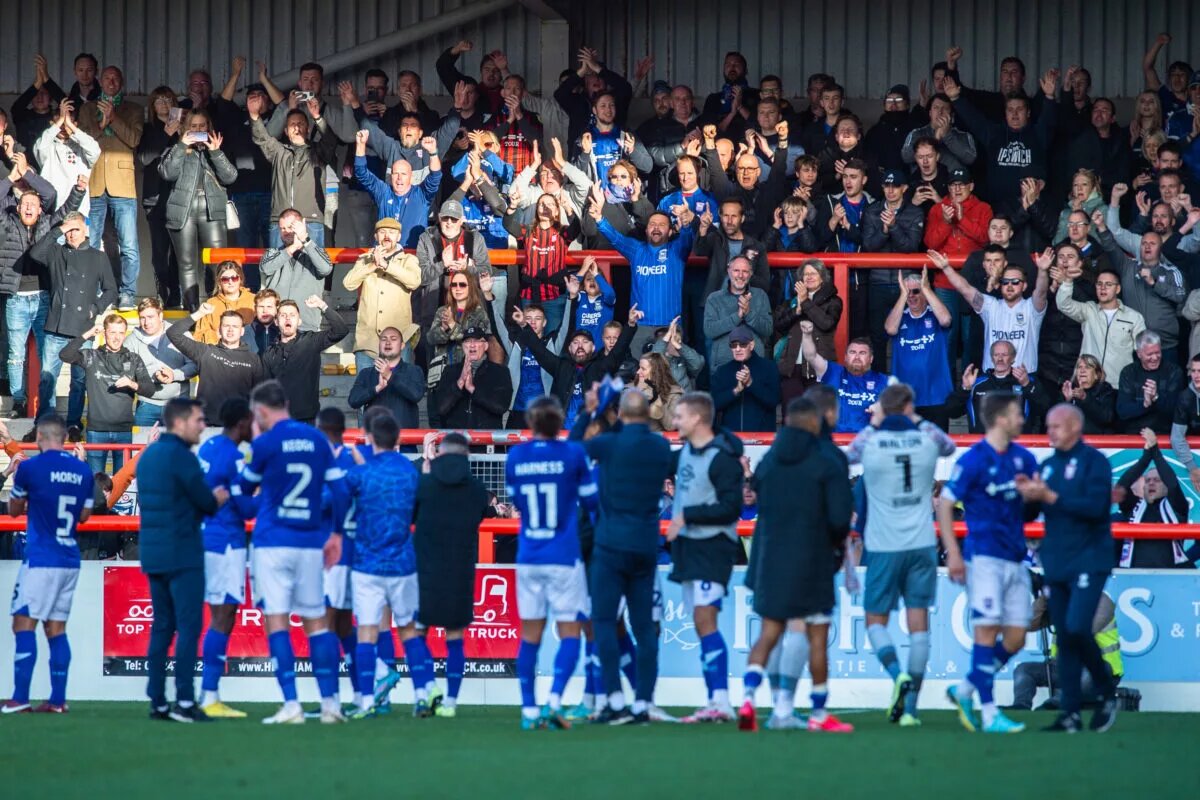 Ipswich Town fans celebrate beating Morecambe to improve their promotion credentials