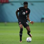 Alphonso Davies, pictured kicking a ball, is in the Canada predicted lineup