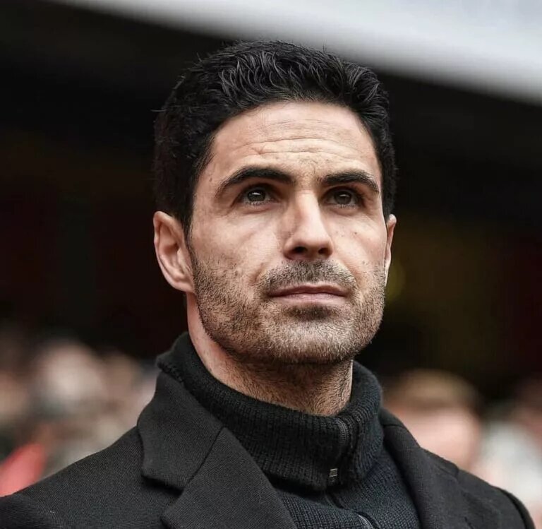 Mikel Arteta looking on