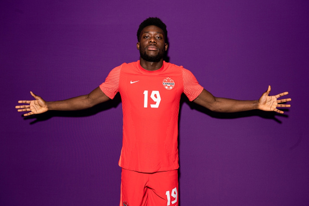 Alphonso Davies, posing with outstretched arms, is in the Canada predicted lineup