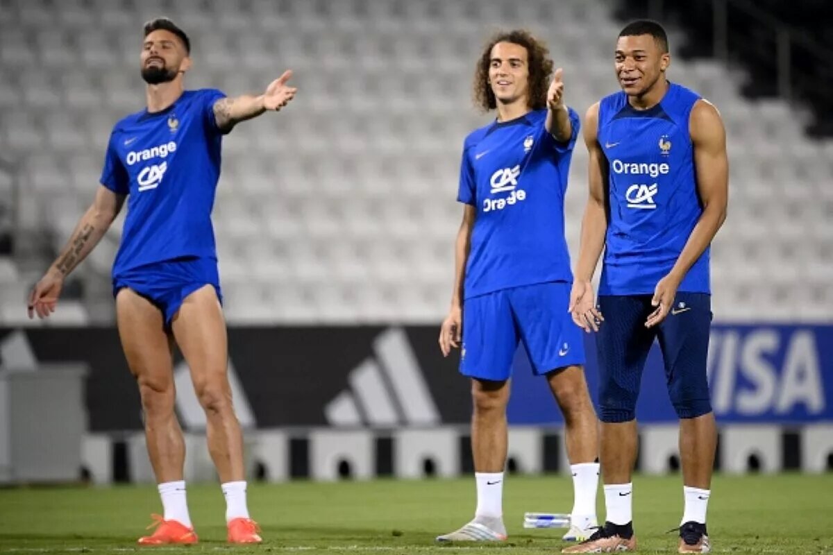 Members of the France predicted lineup, including Kylian Mbappe, prepare for the match in training