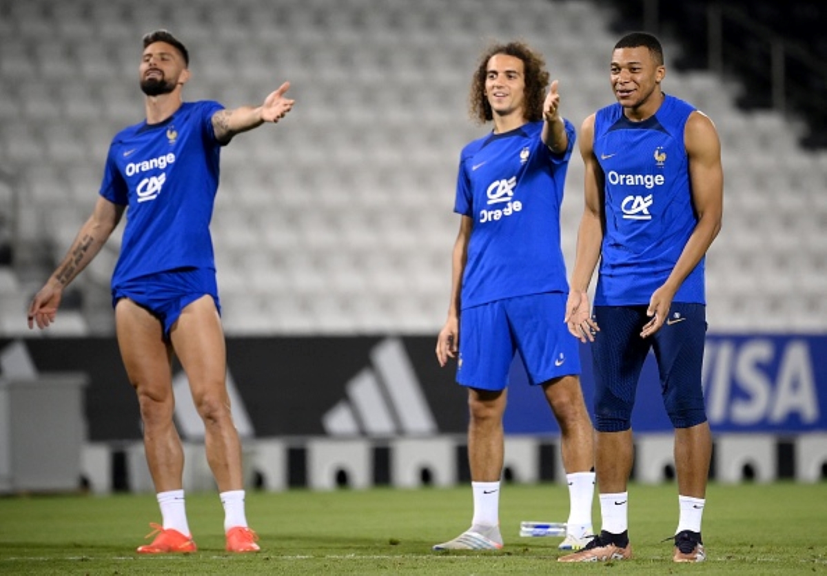 Members of the France predicted lineup, including Kylian Mbappe, prepare for the match in training