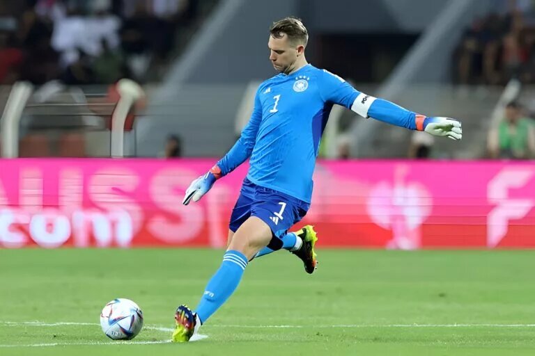 Manuel Neuer kicking a ball