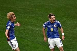 Japan's midfielder Ritsu Doan celebrates his team's first goal on November 23, 2022