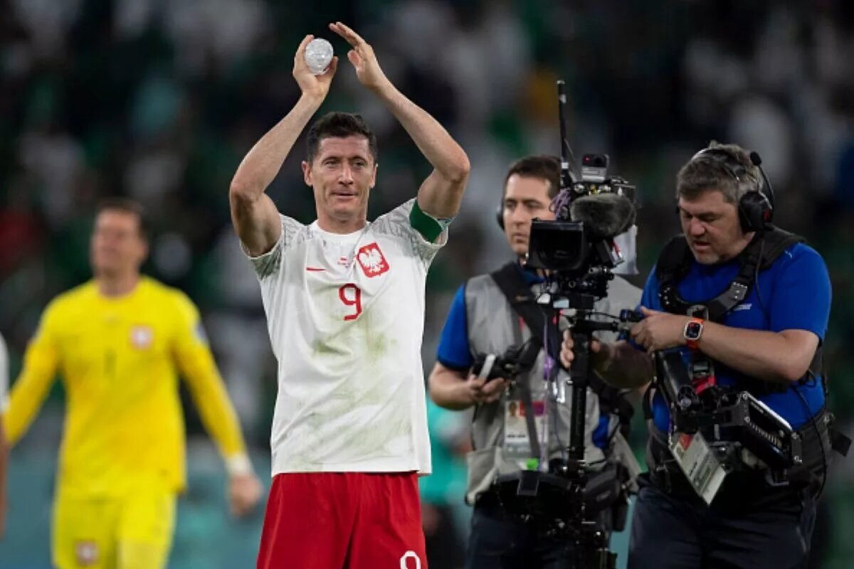 Robert Lewandowski, part of the Poland predicted lineup, applauding to fans
