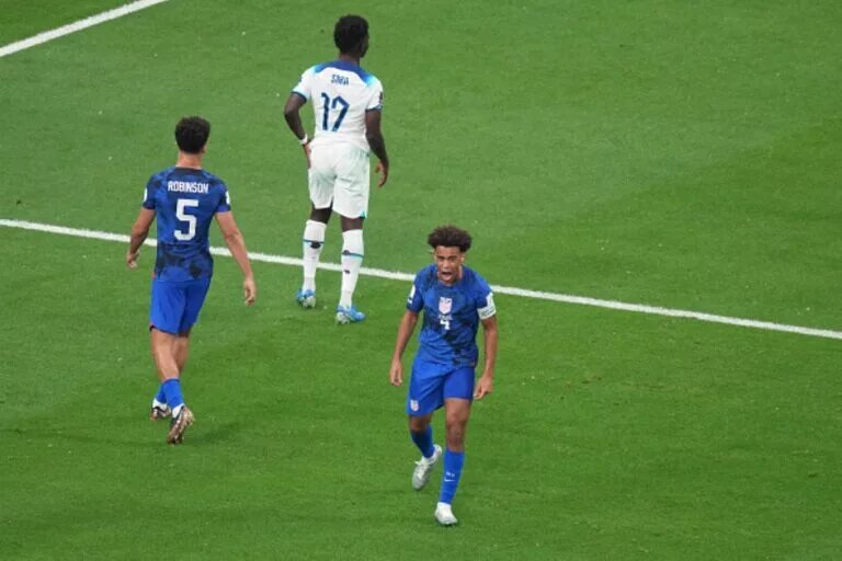 Tyler Adams, in the USA predicted lineup, shouts to a teammate