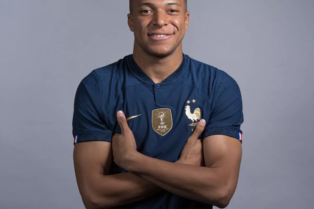 Kylian Mbappe posing for a photo